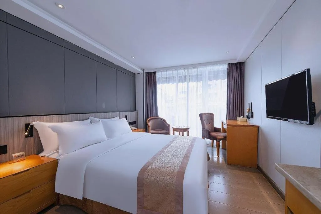 Bed in Zhongshan Louis Hotel