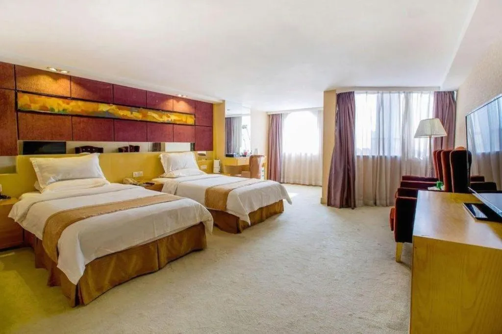 Bed in Zhongshan Louis Hotel