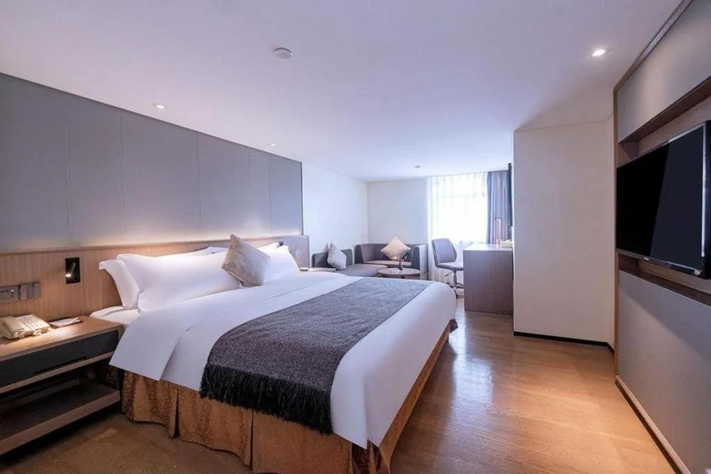 Bed in Zhongshan Louis Hotel