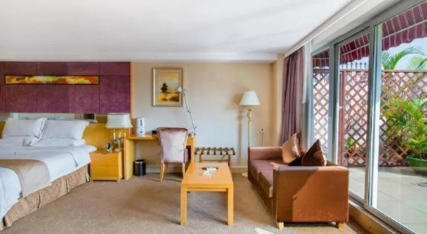 Bed in Zhongshan Louis Hotel