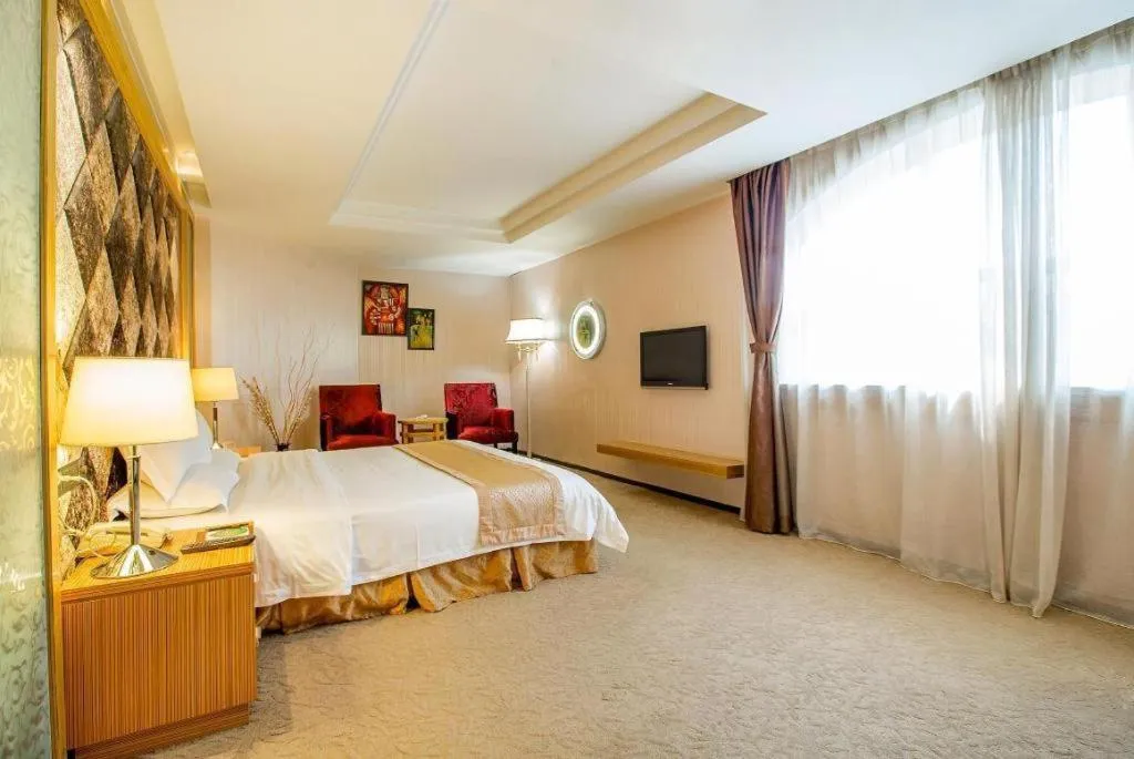 Bed in Zhongshan Louis Hotel