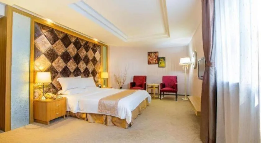 Bed in Zhongshan Louis Hotel