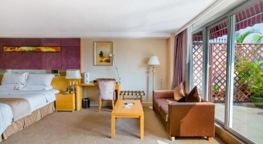 Bed in Zhongshan Louis Hotel