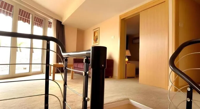 Bed in Zhongshan Louis Hotel