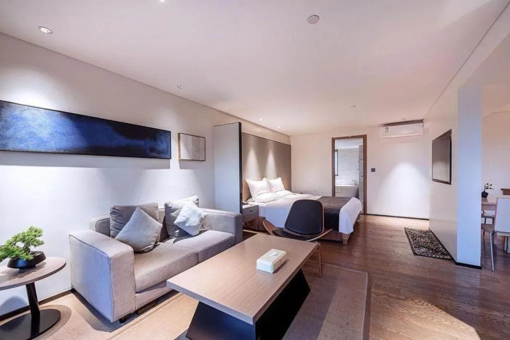 Bed in Zhongshan Louis Hotel