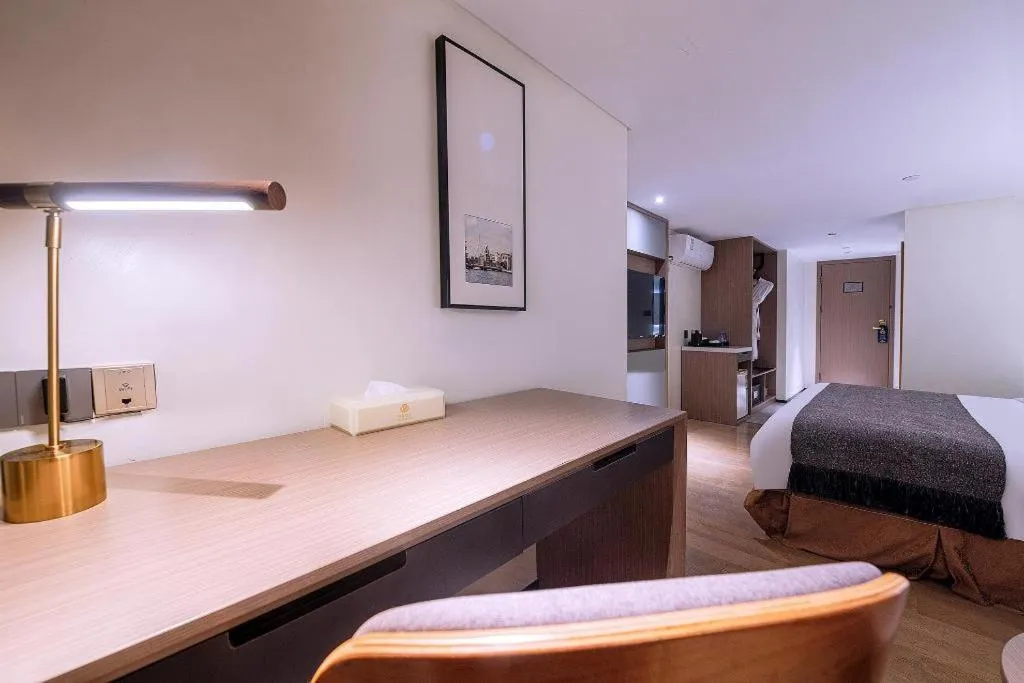 Bed in Zhongshan Louis Hotel