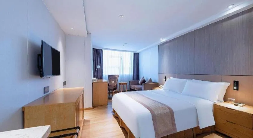 Bed in Zhongshan Louis Hotel