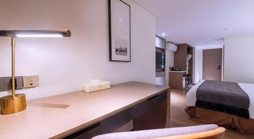 Bed in Zhongshan Louis Hotel