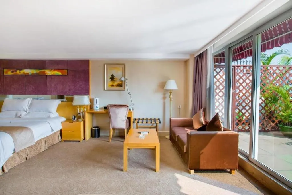 Bed in Zhongshan Louis Hotel