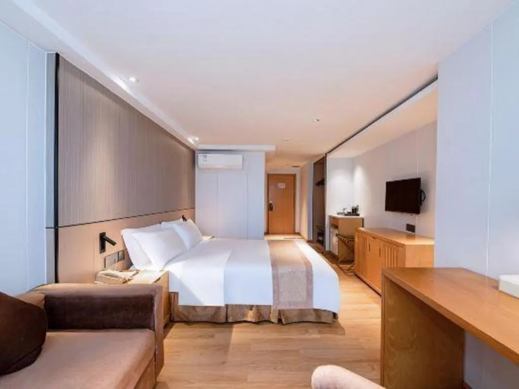 Bed in Zhongshan Louis Hotel