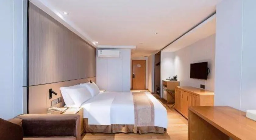 Bed in Zhongshan Louis Hotel