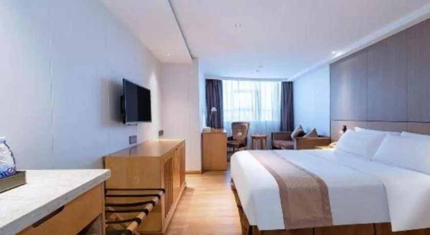 Bed in Zhongshan Louis Hotel