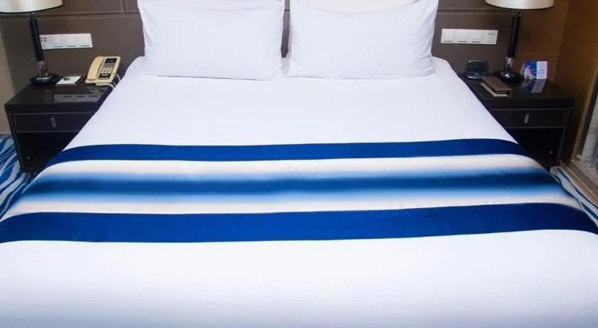 Bed in Brigh Radiance Hotel Yantai