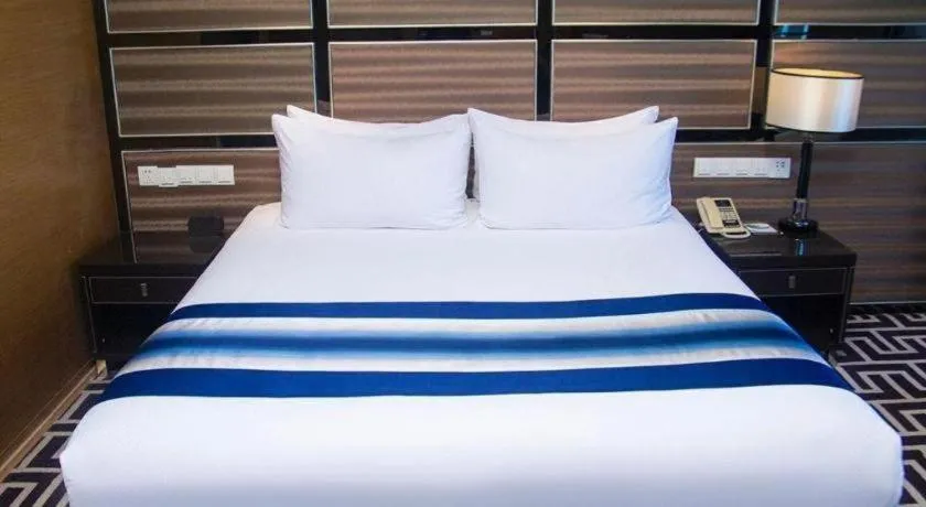 Bed in Brigh Radiance Hotel Yantai