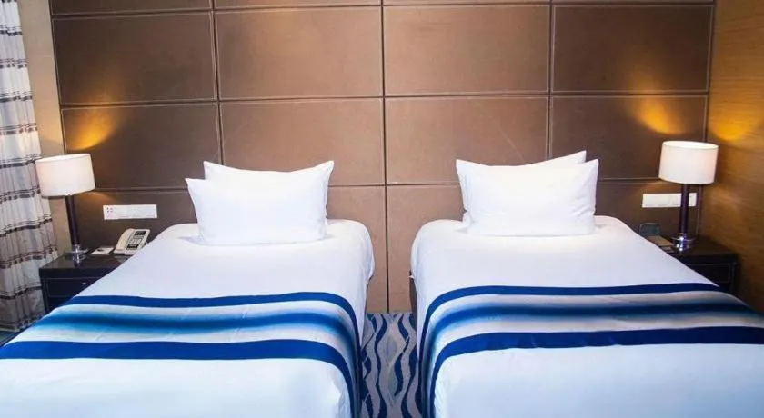 Bed in Brigh Radiance Hotel Yantai