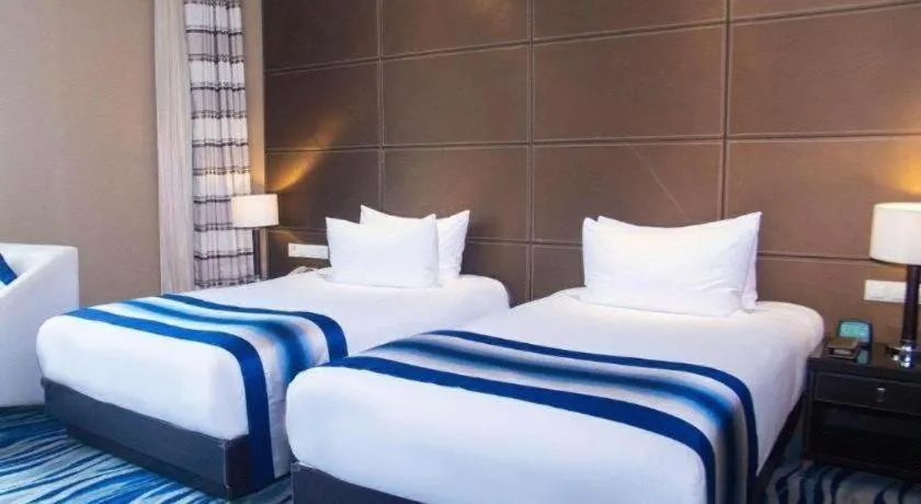 Bed in Brigh Radiance Hotel Yantai