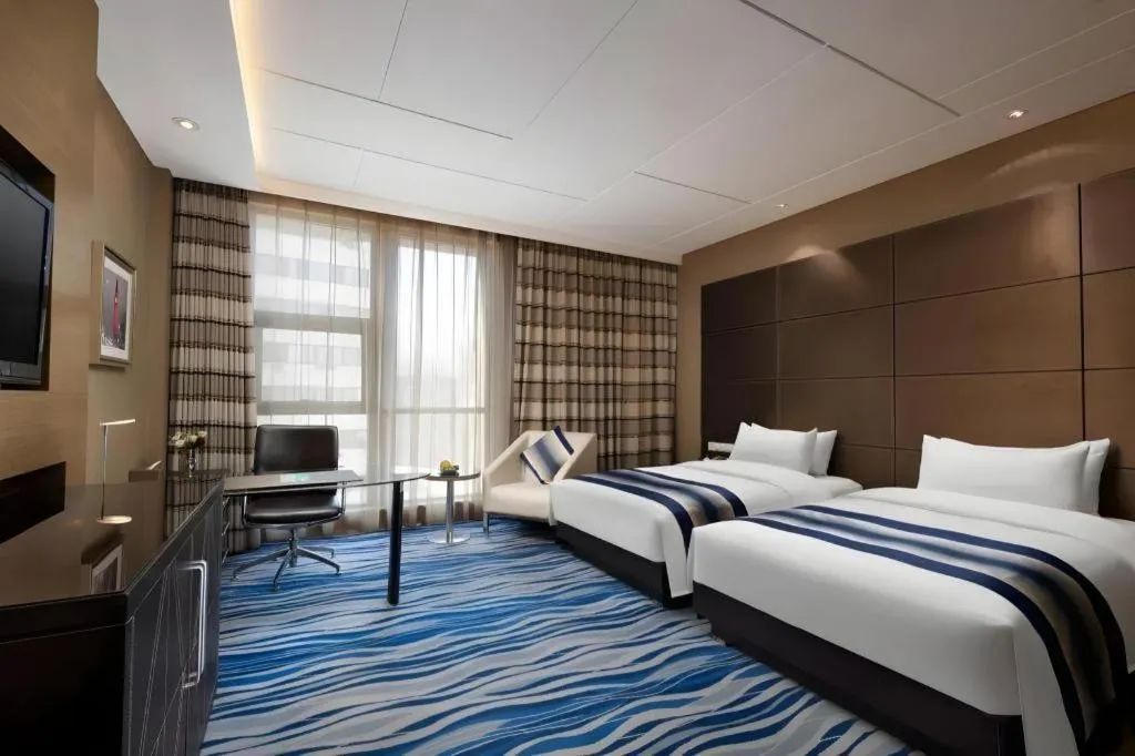 Bed in Brigh Radiance Hotel Yantai