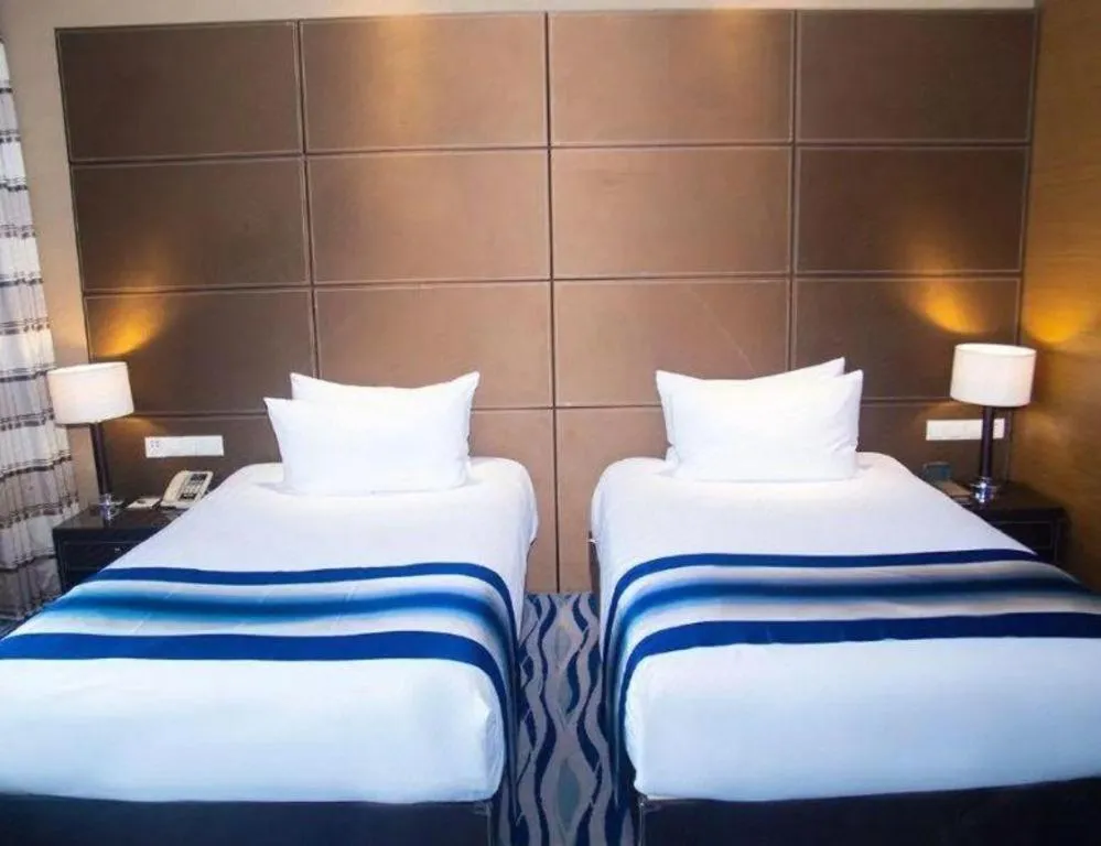 Bed in Brigh Radiance Hotel Yantai