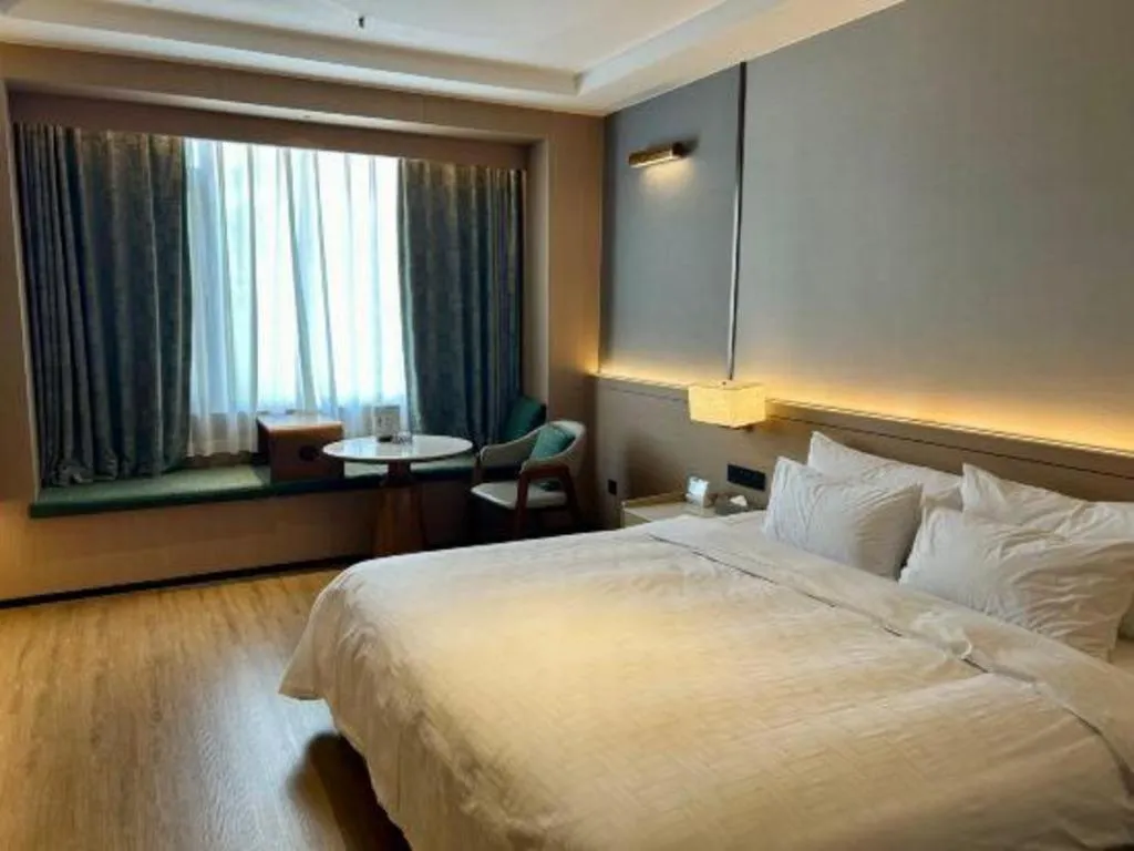 Bed in Zhangjiagang Jiangnan Garden Hotel