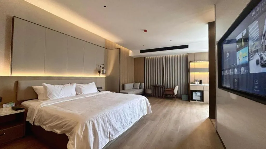 Bed in Zhangjiagang Jiangnan Garden Hotel