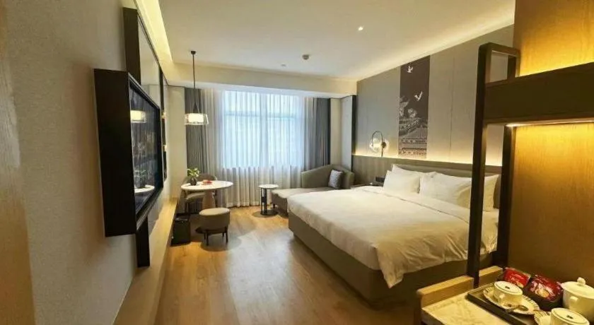 Bed in Zhangjiagang Jiangnan Garden Hotel