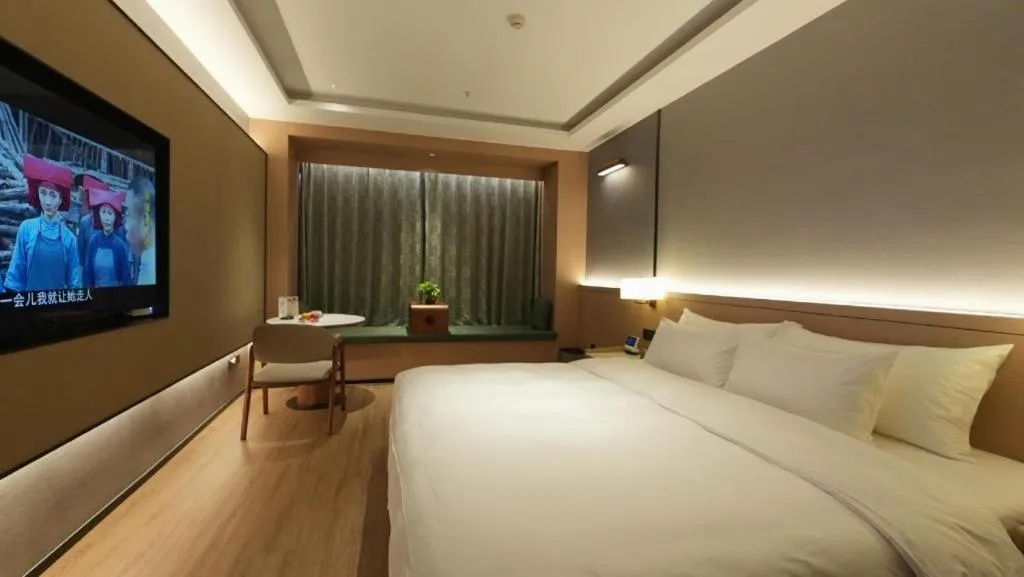 Bed in Zhangjiagang Jiangnan Garden Hotel