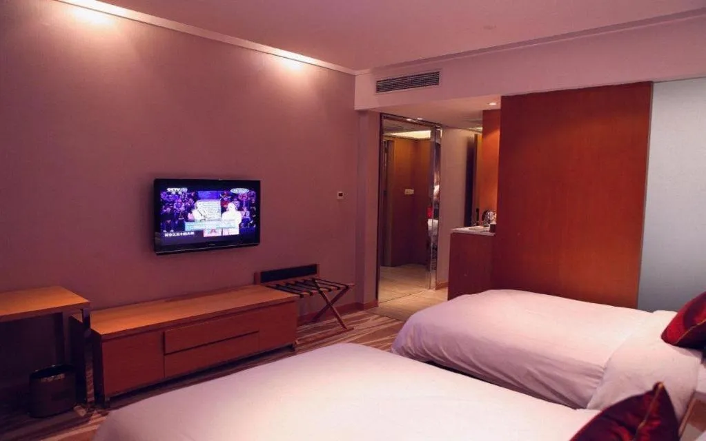 Bed in Zhangjiagang Jiangnan Garden Hotel