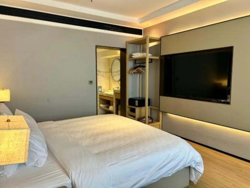 Bed in Zhangjiagang Jiangnan Garden Hotel