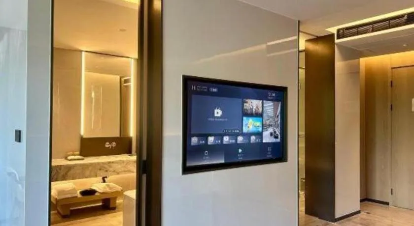 Bed in Zhangjiagang Jiangnan Garden Hotel