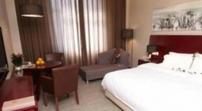 Bed in Zhangjiagang Jiangnan Garden Hotel