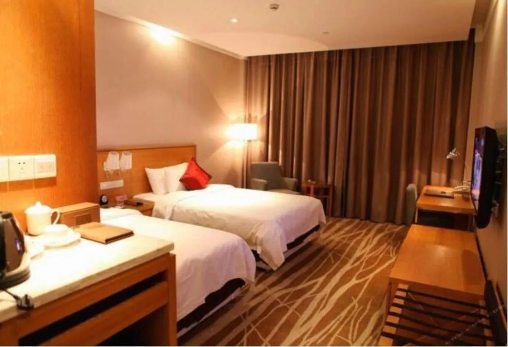 Bed in Zhangjiagang Jiangnan Garden Hotel