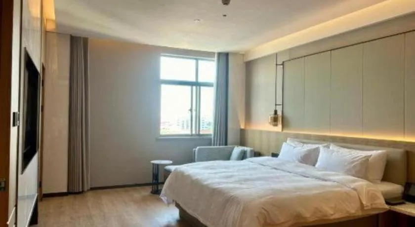 Bed in Zhangjiagang Jiangnan Garden Hotel