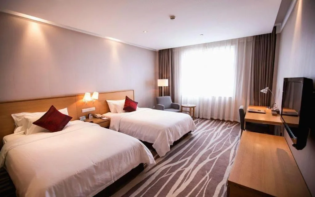 Bed in Zhangjiagang Jiangnan Garden Hotel