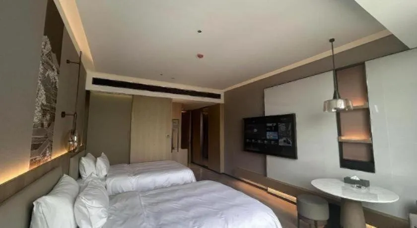 Bed in Zhangjiagang Jiangnan Garden Hotel