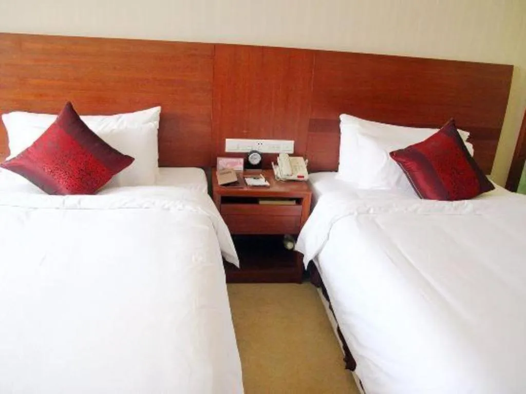 Bed in Zhangjiagang Jiangnan Garden Hotel