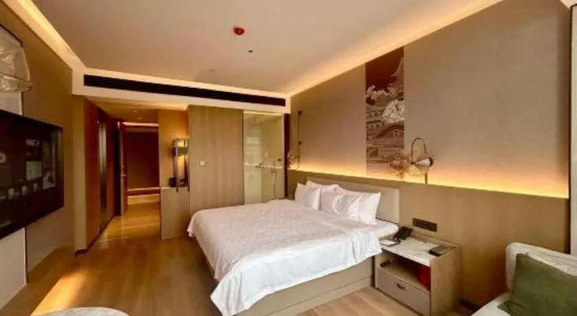 Bed in Zhangjiagang Jiangnan Garden Hotel