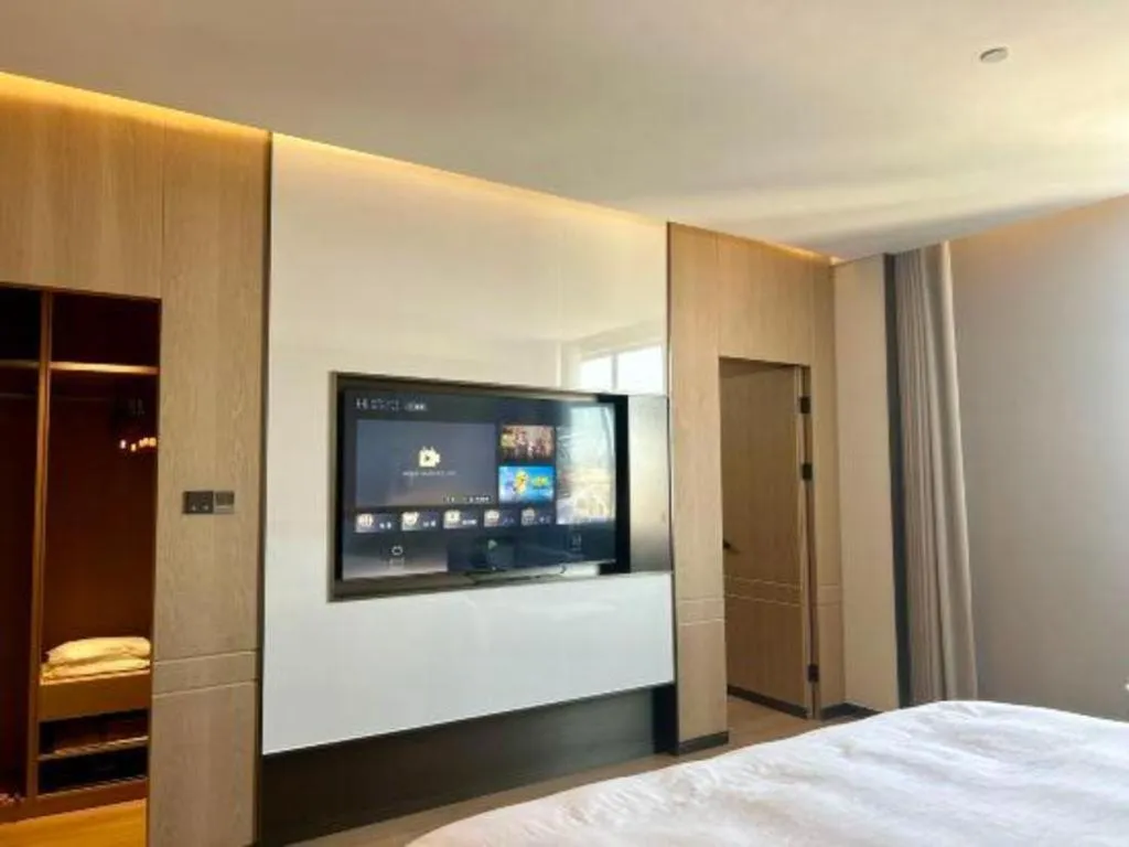 Bed in Zhangjiagang Jiangnan Garden Hotel