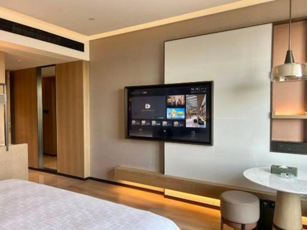 Bed in Zhangjiagang Jiangnan Garden Hotel