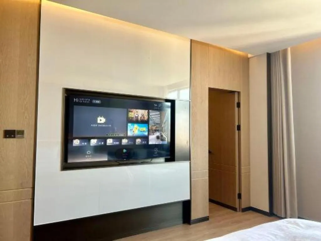 Bed in Zhangjiagang Jiangnan Garden Hotel