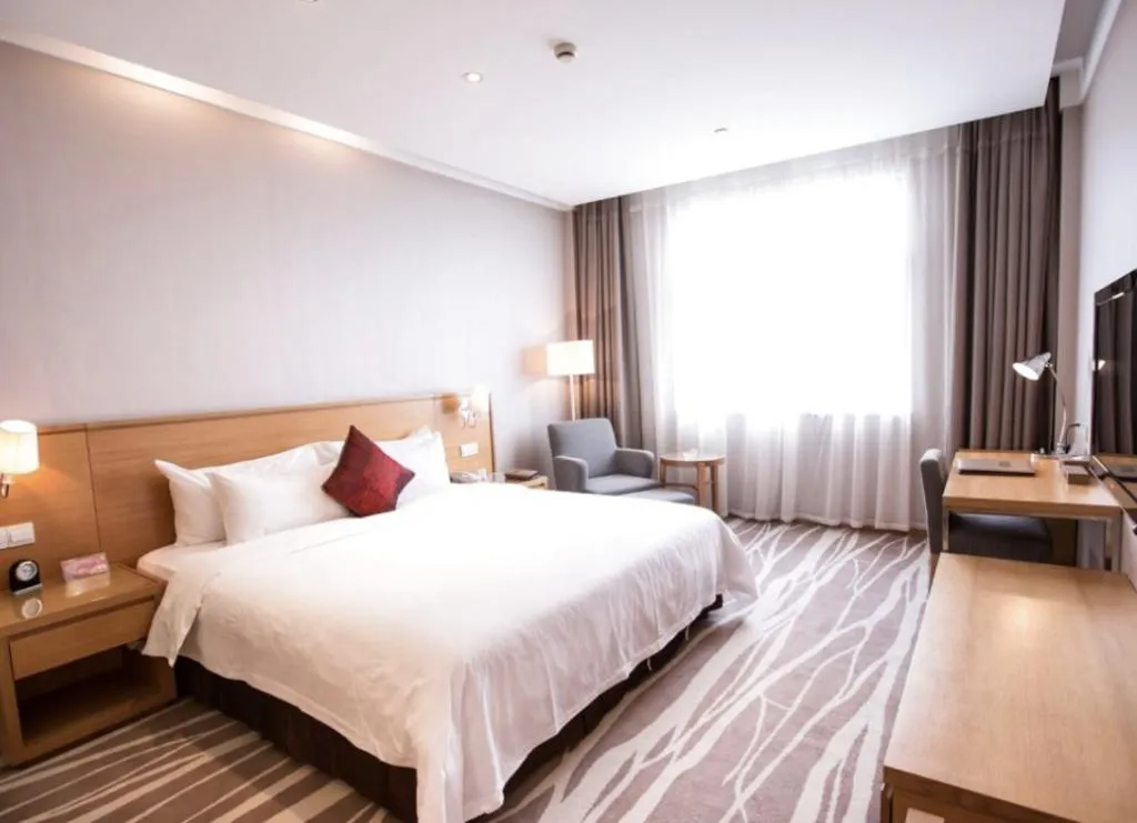 Bed in Zhangjiagang Jiangnan Garden Hotel