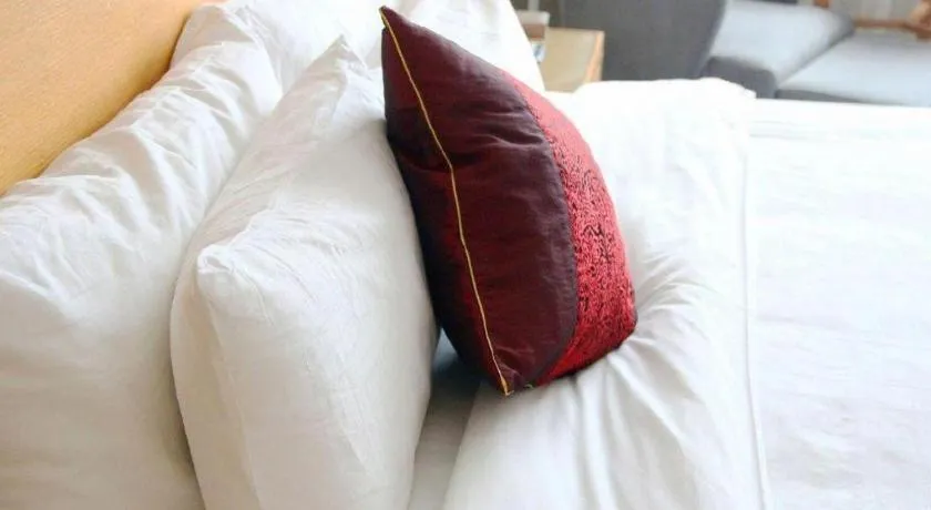 Bed in Zhangjiagang Jiangnan Garden Hotel