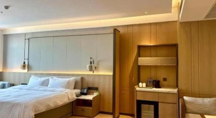 Bed in Zhangjiagang Jiangnan Garden Hotel