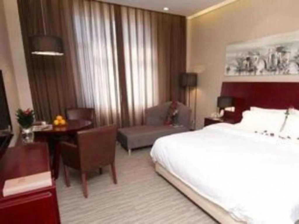 Bed in Zhangjiagang Jiangnan Garden Hotel