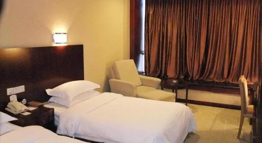 Bed in Zhangjiagang Jiangnan Garden Hotel