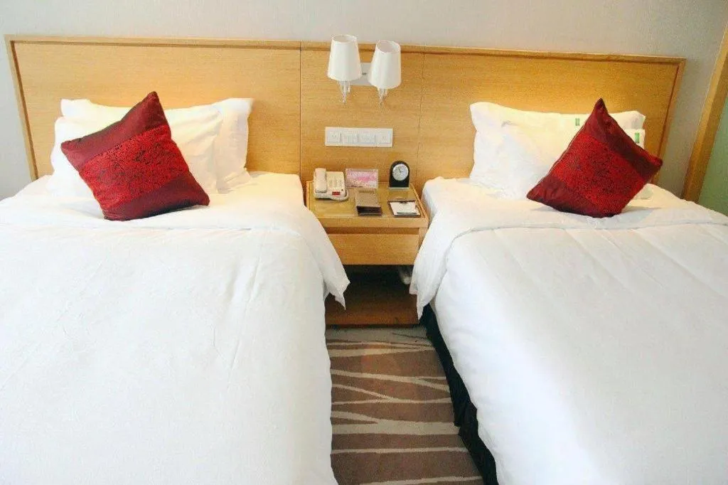 Bed in Zhangjiagang Jiangnan Garden Hotel