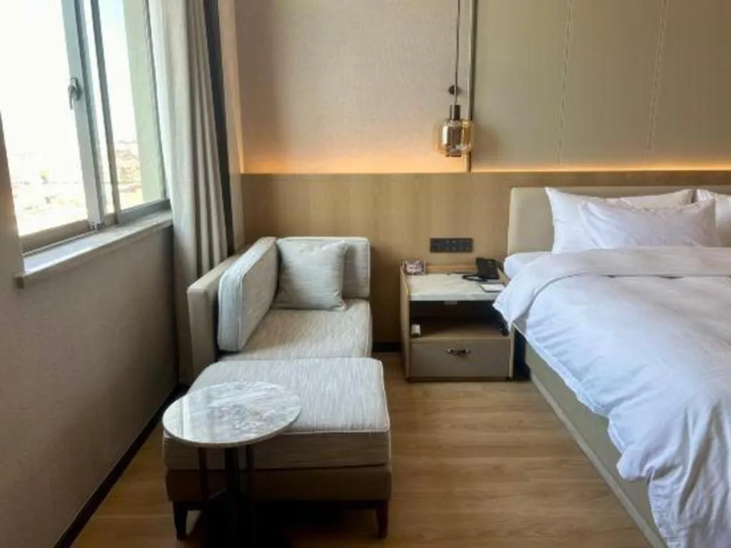 Bed in Zhangjiagang Jiangnan Garden Hotel