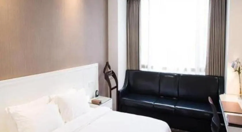 Bed in Zhangjiagang Jiangnan Garden Hotel