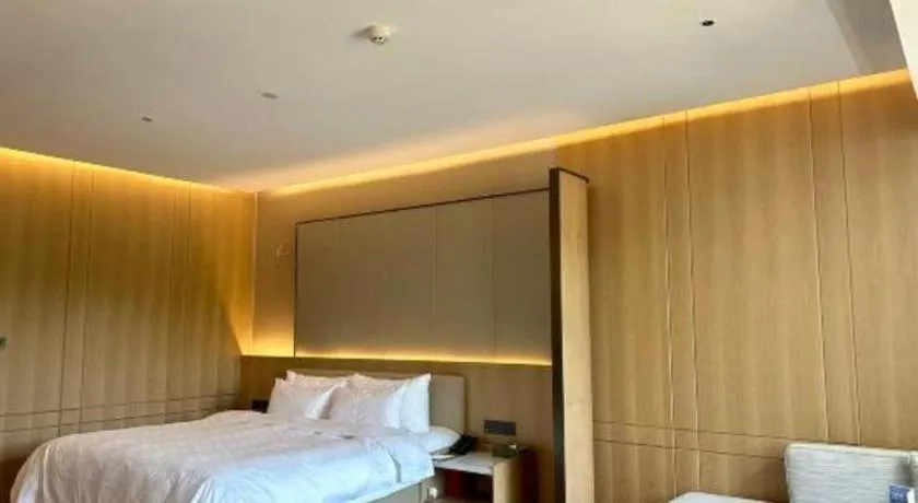 Bed in Zhangjiagang Jiangnan Garden Hotel