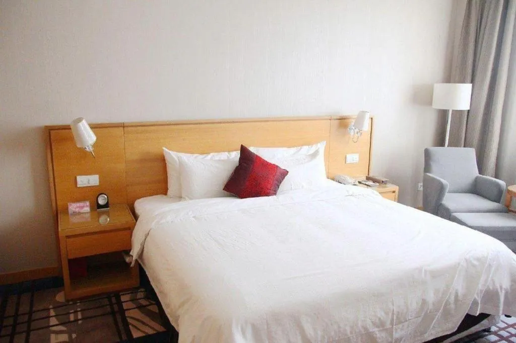 Bed in Zhangjiagang Jiangnan Garden Hotel