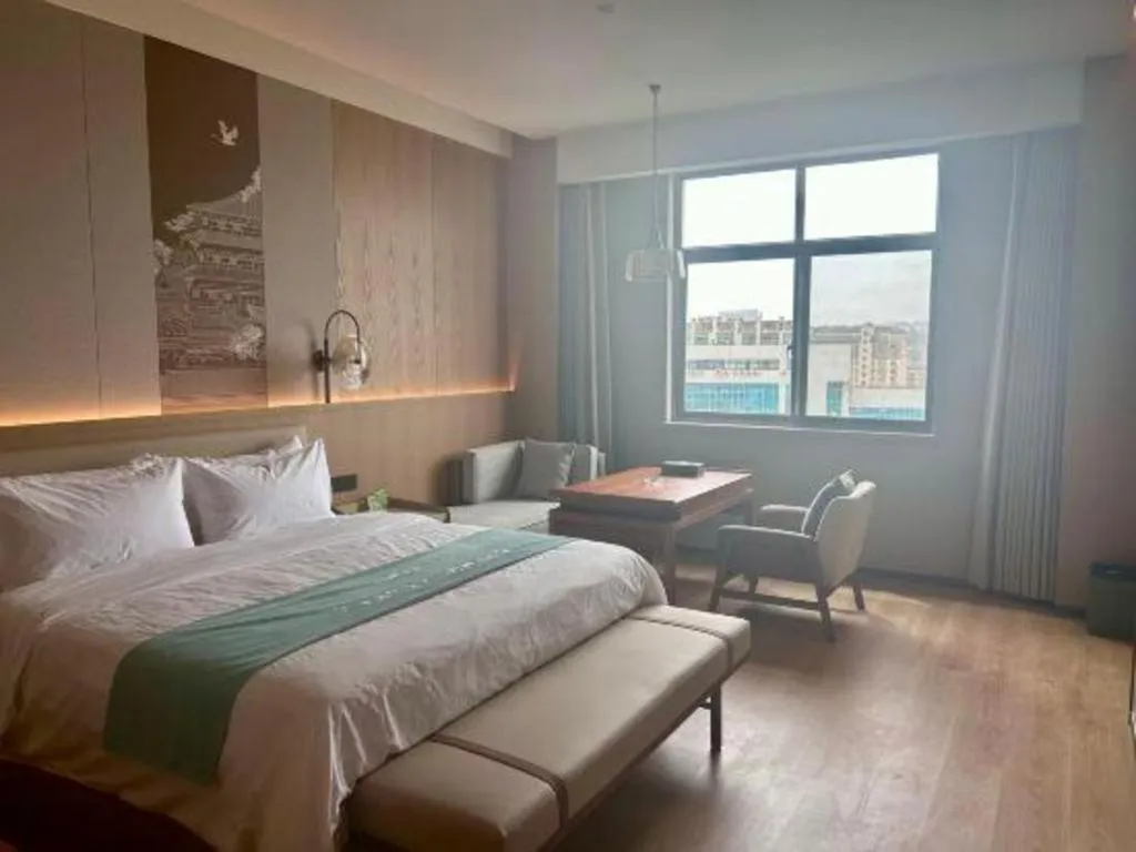 Bed in Zhangjiagang Jiangnan Garden Hotel